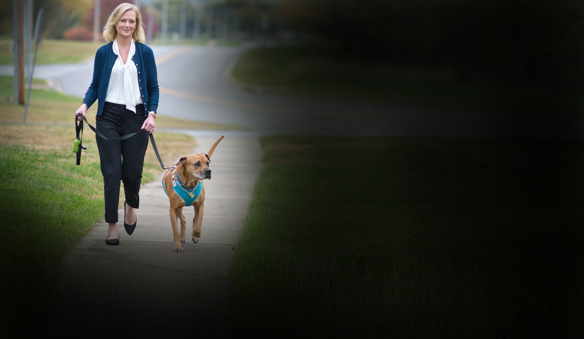 Woman walking her dog